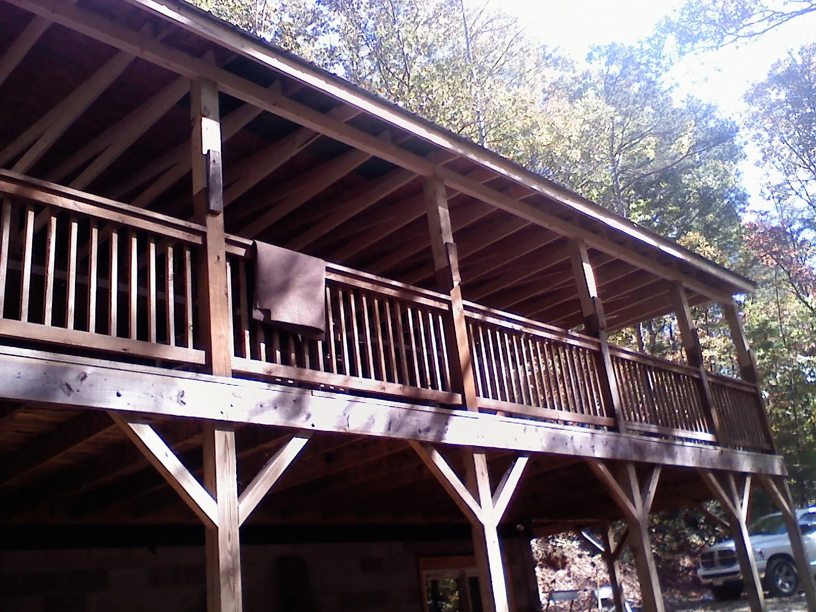 Timber framing under a new elevated porch and deck — Roof Leak Repair in Deer Island by Roofing Brothers